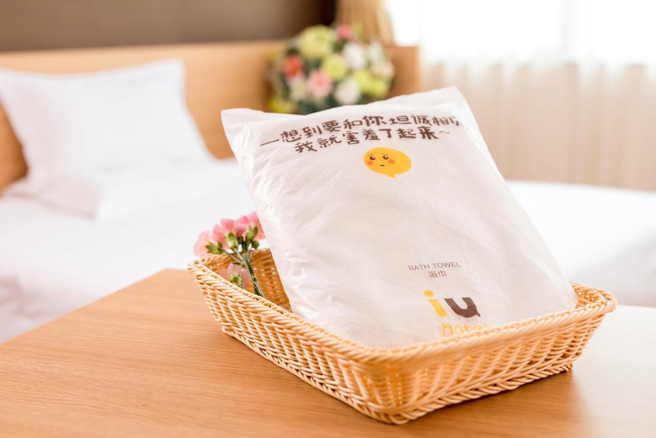 Iu Hotel Hezhou Bus Terminal Bagian luar foto