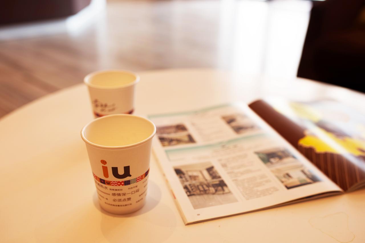 Iu Hotel Hezhou Bus Terminal Bagian luar foto